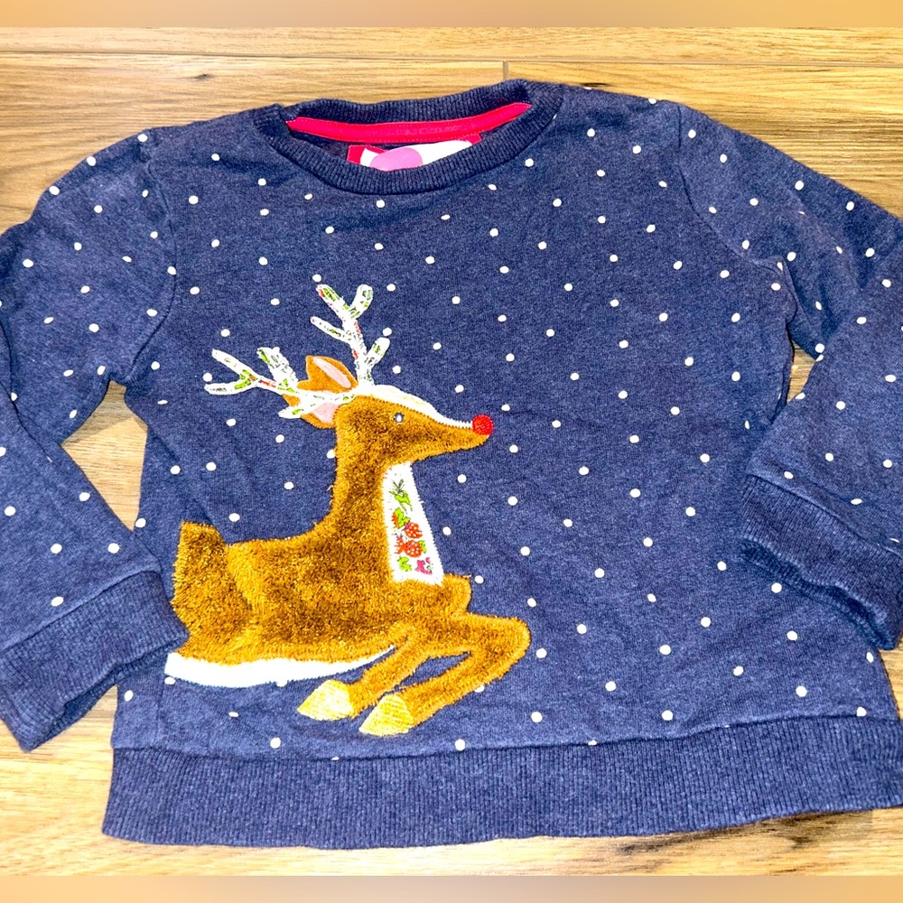 Mini Boden Girl’s Reindeer Sweatshirt.